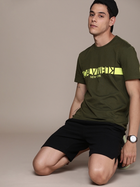 

Calvin Klein Jeans Men Olive Green Pure Cotton Brand Logo T-shirt
