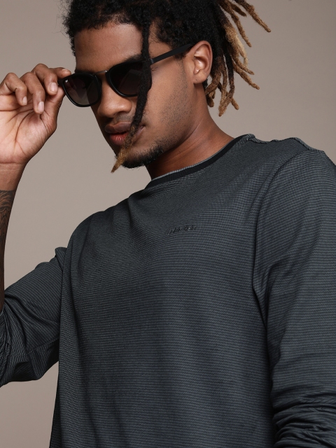 

Calvin Klein Jeans Men Black & Off-White Striped T-shirt