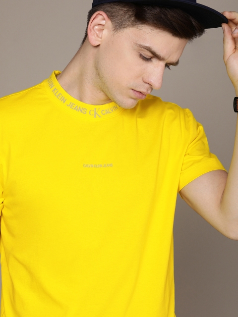 

Calvin Klein Jeans Men Yellow Solid Round Neck T-shirt