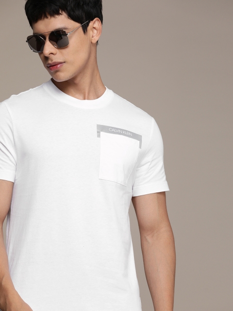 

Calvin Klein Jeans Men White Solid Reflective Pocket Detailing Pure Cotton T-shirt