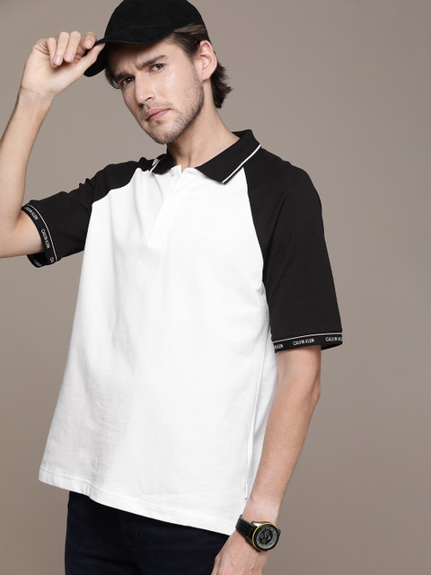

Calvin Klein Jeans Men White Solid Polo Collar T-shirt
