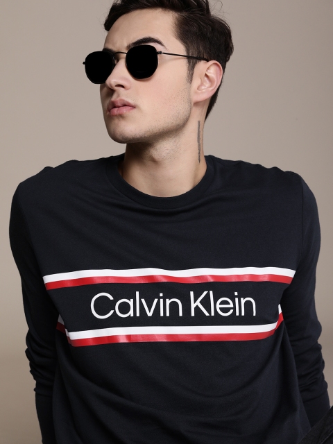 

Calvin Klein Jeans Men Navy Blue Brand Logo Printed T-shirt