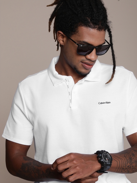 

Calvin Klein Jeans Men White Solid Pique Polo Collar T-shirt