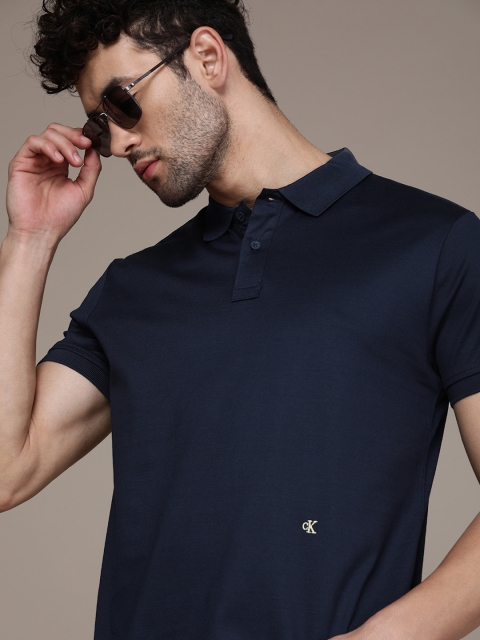 

Calvin Klein Jeans Men Navy Blue Polo Collar T-shirt