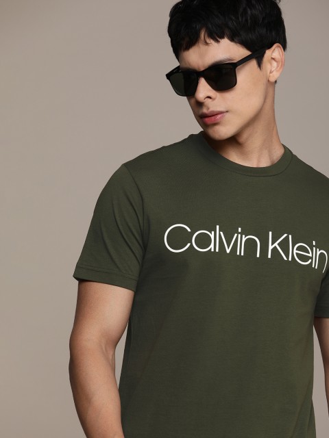 

Calvin Klein Jeans Men Olive Green & White Brand Logo Printed T-shirt