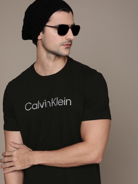 

Calvin Klein Jeans Men Black Solid Pure Cotton T-shirt With White Typography