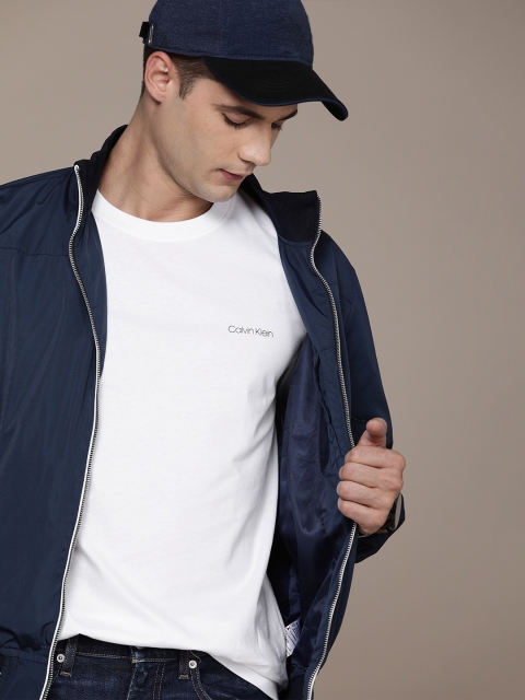 

Calvin Klein Jeans Men White Solid Pure Cotton T-shirt with Printed Detail