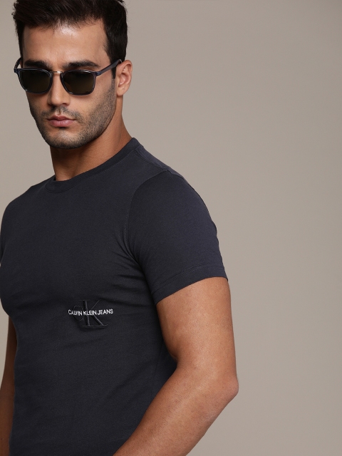 

Calvin Klein Jeans Men Navy Blue Embroidered T-shirt