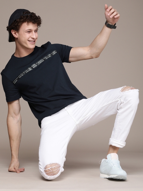 

Calvin Klein Jeans Men Navy Blue White Printed Pure Cotton T-shirt