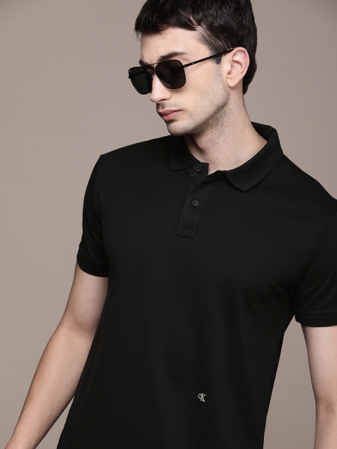 

Calvin Klein Jeans Men Black Solid A- PRM SS REG OFF PLACED Polo Collar Pure Cotton T-shirt