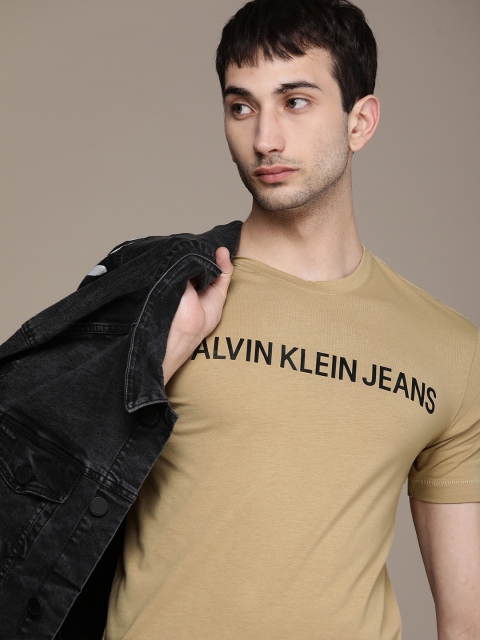 

Calvin Klein Jeans Men Beige Brand Logo Printed Slim Fit Pure Cotton T-shirt