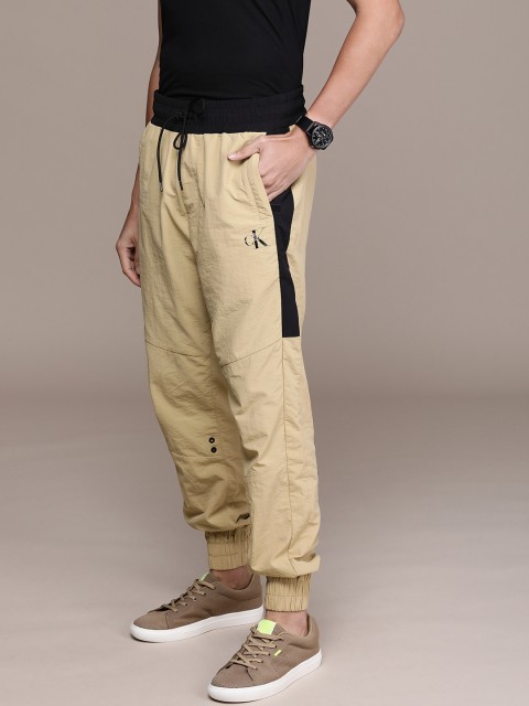 

Calvin Klein Jeans Men Brown & Black Colourblocked Printed Wrinkle Free Joggers