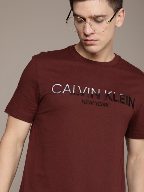 

Calvin Klein Jeans Men Maroon & Black Printed T-shirt