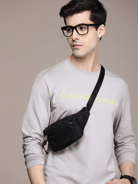 

Calvin Klein Jeans Men Grey & Yellow Brand Logo Printed Applique T-shirt