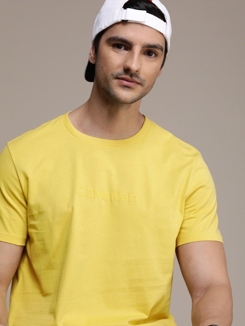 

Calvin Klein Jeans Men Yellow Brand Logo Printed T-shirt
