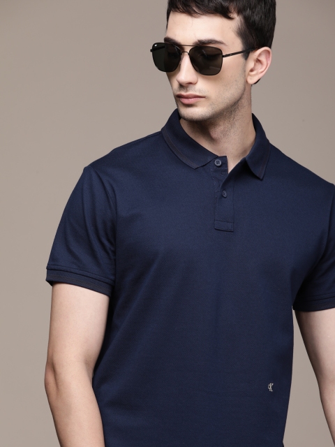 

Calvin Klein Jeans Men Navy Blue A- PRM SS REG OFF PLACED Solid Polo Collar T-shirt