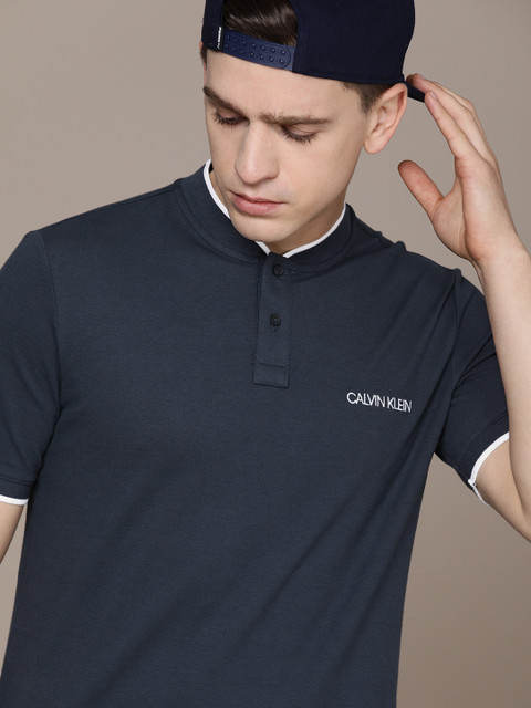 

Calvin Klein Jeans Men Navy Blue Brand Logo Printed Polo Collar T-shirt
