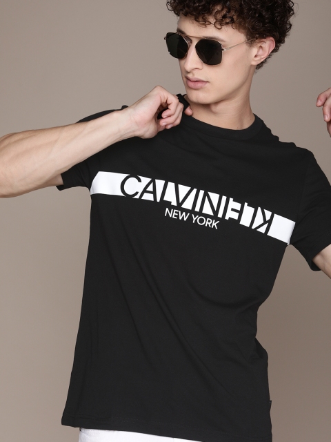 

Calvin Klein Jeans Men Black Pure Cotton Reversed Brand Logo Pure Cotton T-shirt
