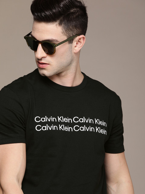 

Calvin Klein Jeans Men Black Multi Brand Logo Printed Pure Cotton Casual T-shirt