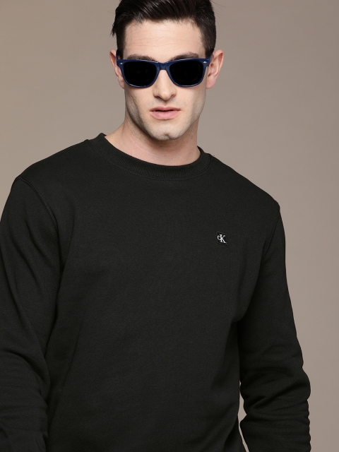 

Calvin Klein Jeans Men Black Solid Pure Cotton Sweatshirt