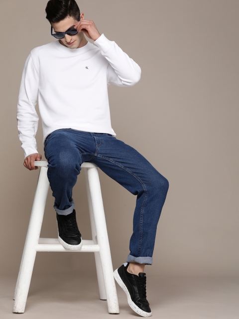 

Calvin Klein Jeans Men White Solid Pure Cotton Sweatshirt