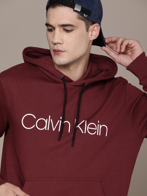 

Calvin Klein Jeans Men Maroon & White Hooded Printed Sweatshirt