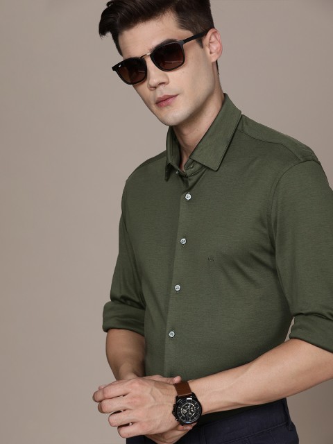 

Calvin Klein Jeans Men Olive Green Solid Pure Cotton Slim Fit Semi-Formal Shirt
