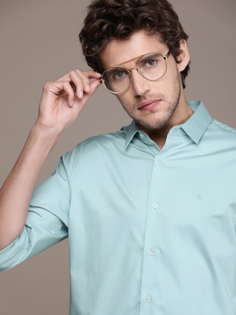 

Calvin Klein Jeans Men Blue Solid Slim Fit Casual Shirt