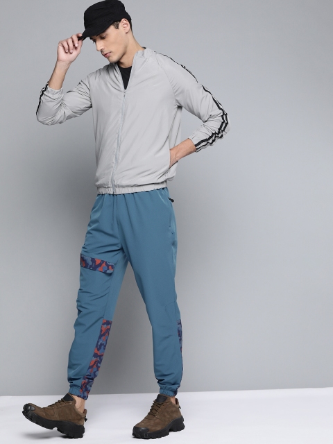 

HRX By Hrithik Roshan Outdoor Men Real Teal Lycra Camouflage Track Pants