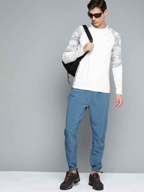 

HRX By Hrithik Roshan Outdoor Men Real Teal Lycra Brand Carrier Tracksuit