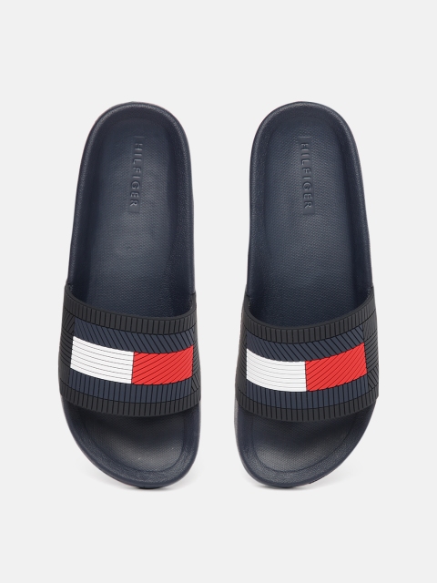 

Tommy Hilfiger Men Navy Blue and Red Solid Sliders