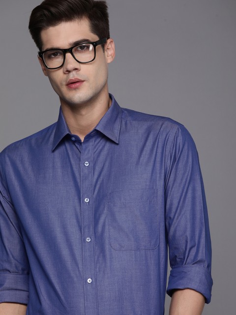 

Raymond Men Blue Solid Slim Fit Formal Shirt