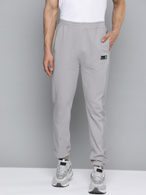 

HRX By Hrithik Roshan Lifestyle Men Wet Weather Bio-Wash Solid Joggers, Grey