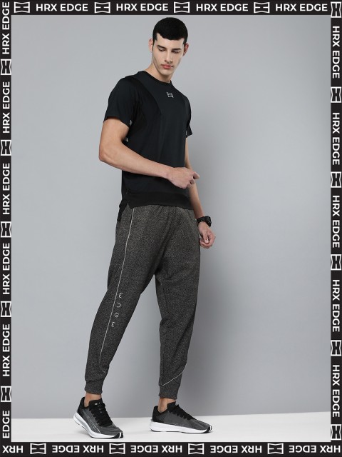 

HRX By Hrithik Roshan EDGE Lifestyle Men Jet Black Bio-Wash Typography Track Pants, Charcoal