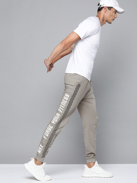 

HRX By Hrithik Roshan Men Wet Weather Typographic Slim Fit Rapid-Dry Training Joggers, Grey