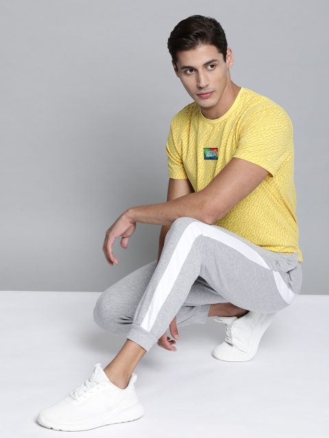 

HRX by Hrithik Roshan Men Grey Melange Solid Cropped Joggers
