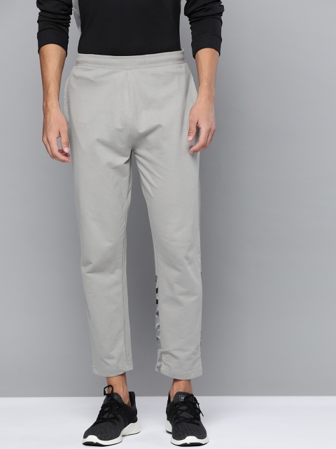 

HRX By Hrithik Roshan Men Wet Weather Solid Regular Fit Bio-Wash Lifestyle Track Pants, Grey