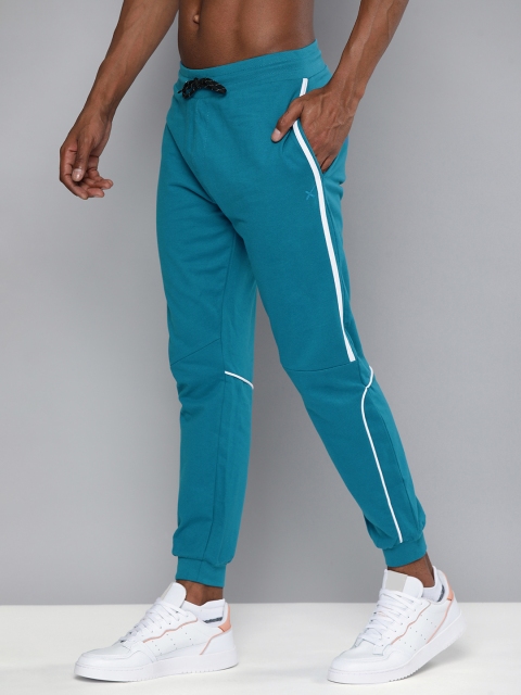 

HRX By Hrithik Roshan Men Blue Sapphire Solid Slim Fit Bio-Wash Lifestyle Joggers, Turquoise blue