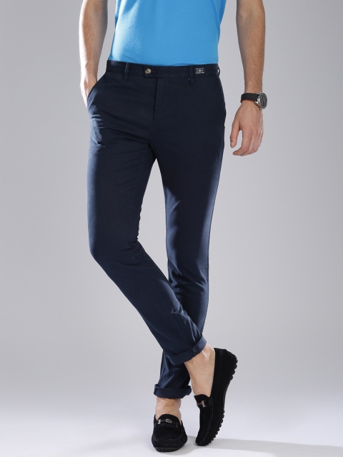 

Tommy Hilfiger Men Navy Solid Straight Fit Chino Trousers, Navy blue
