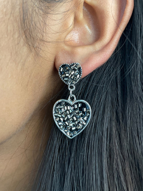 

Ayesha Silver-Toned & Black Enamelled Heart Shaped Drop Earrings