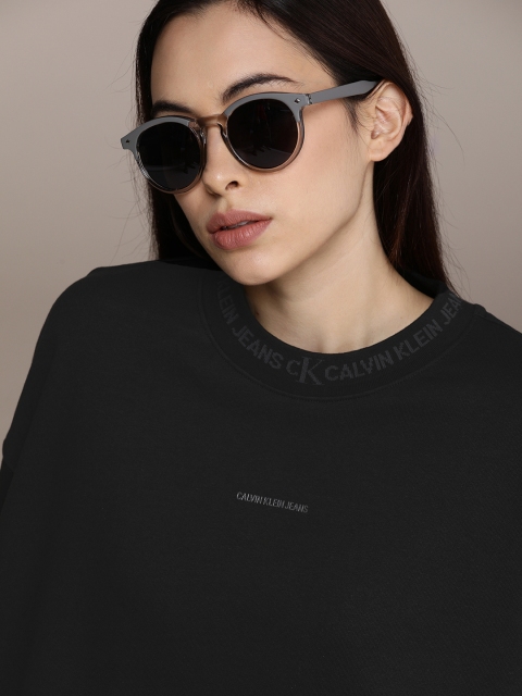 

Calvin Klein Jeans Women Black Solid Sweatshirt