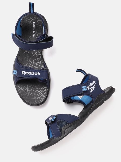 

Reebok Men Navy Blue Brand Logo Print Aztrix Sports Sandals