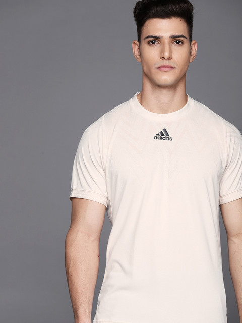 

ADIDAS Men Off-White Solid Tennis Primeblue Freelift T-Shirt