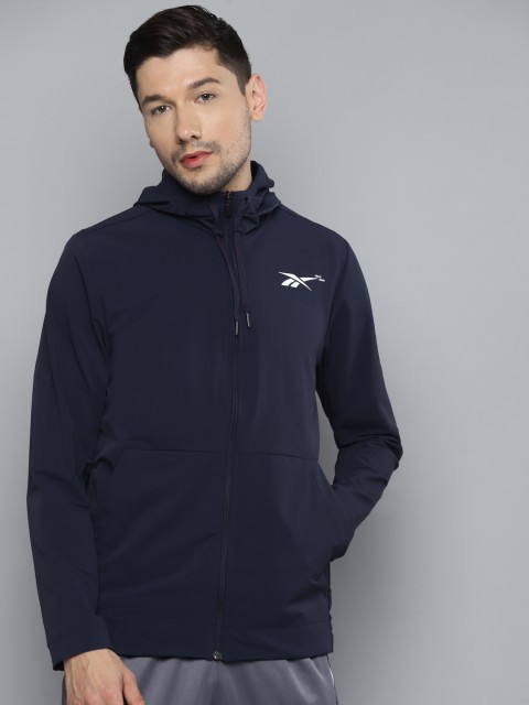 

Reebok Men Navy Blue TS Performance FZ Hooded Solid Jacket