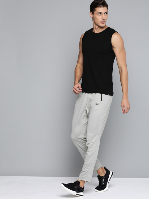 

Reebok Men Grey Solid Training WOR Knit Track Pants