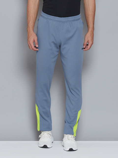 

Reebok Men Blue Solid WF Track Pants