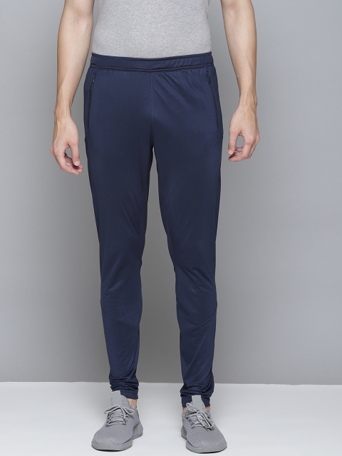 

Reebok Men Navy Blue Solid Workout Track Pants