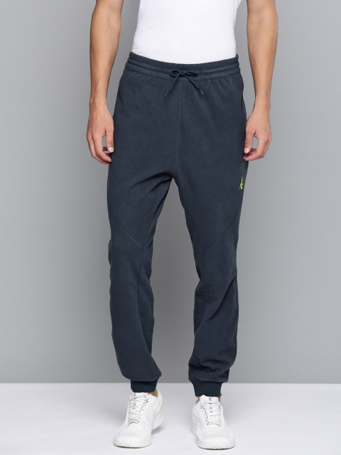 

Reebok Men Navy Blue Solid WOR Fleece Joggers