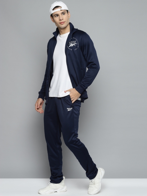 

Reebok Men Navy Blue Solid WR ELE Tracksuits