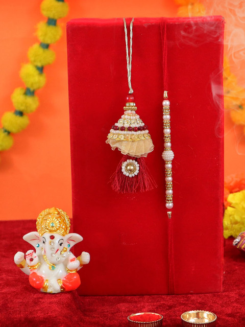

TIED RIBBONS Red & White Bhaiya Bhabhi Lumba Rakhi with Ganesha Idol Combo Gift Set